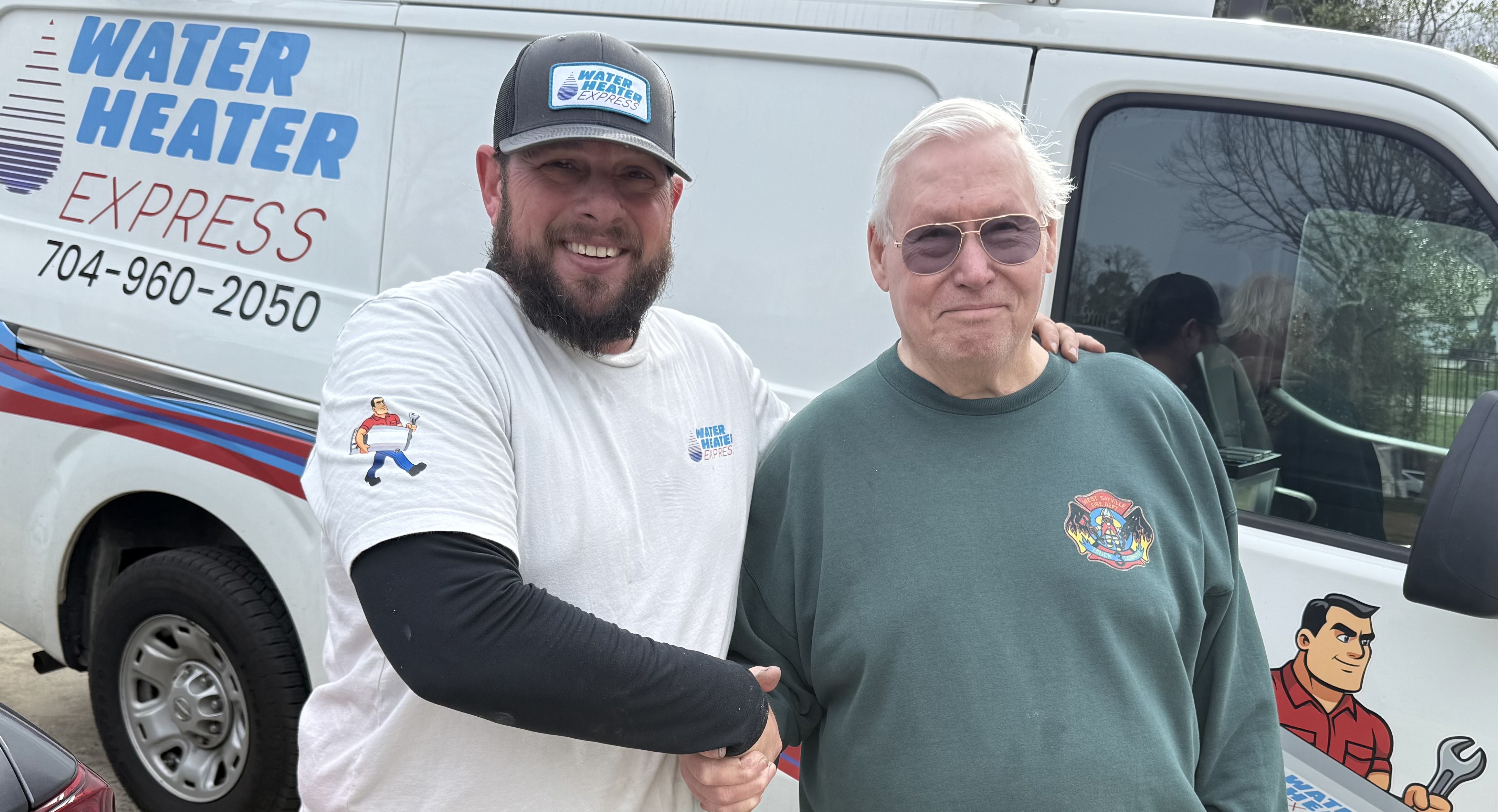 Water Heater Express technician Matt with satisfied Cornelius customer