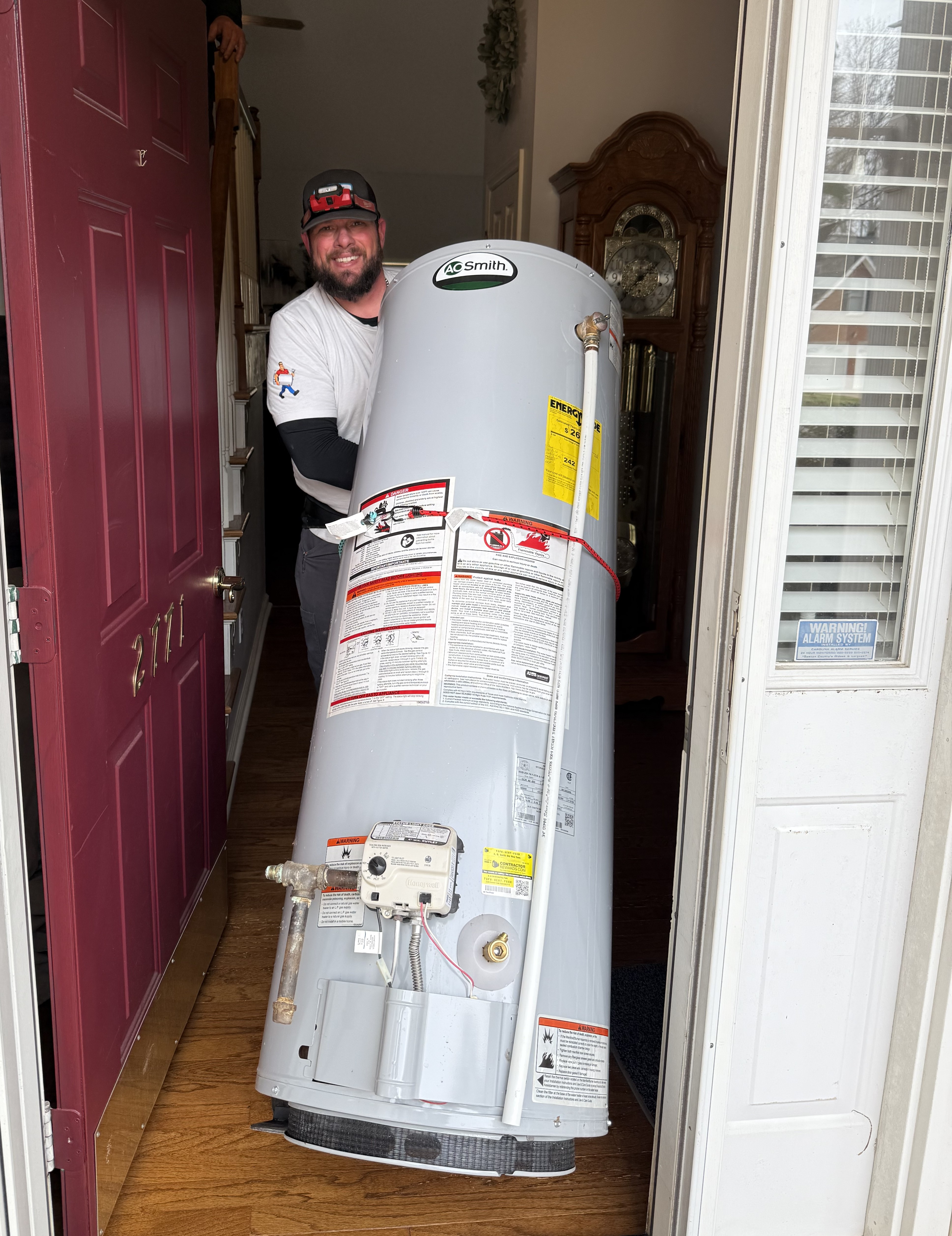 Water Heater Express technician Matt delivering new water heater for emergency replacement